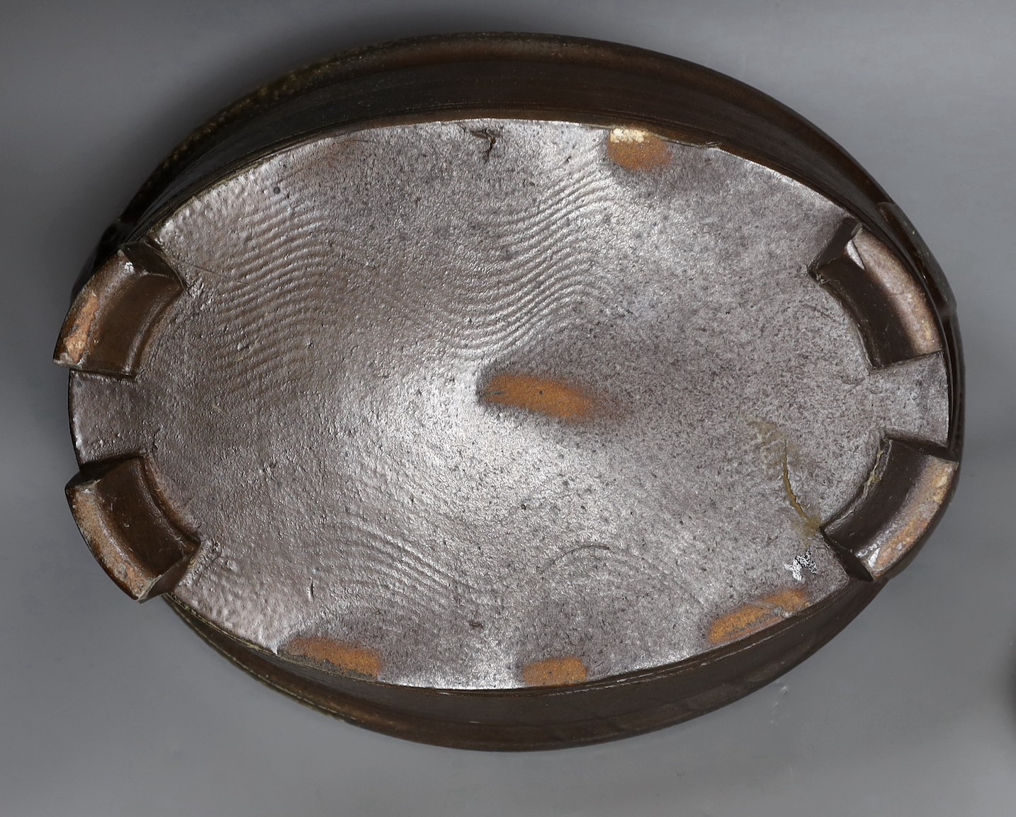 A large studio pottery grey salt glazed stoneware two handled dish, unmarked, 36cm wide